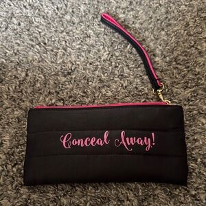 Conceal Away Black and Pink Wristlet bag